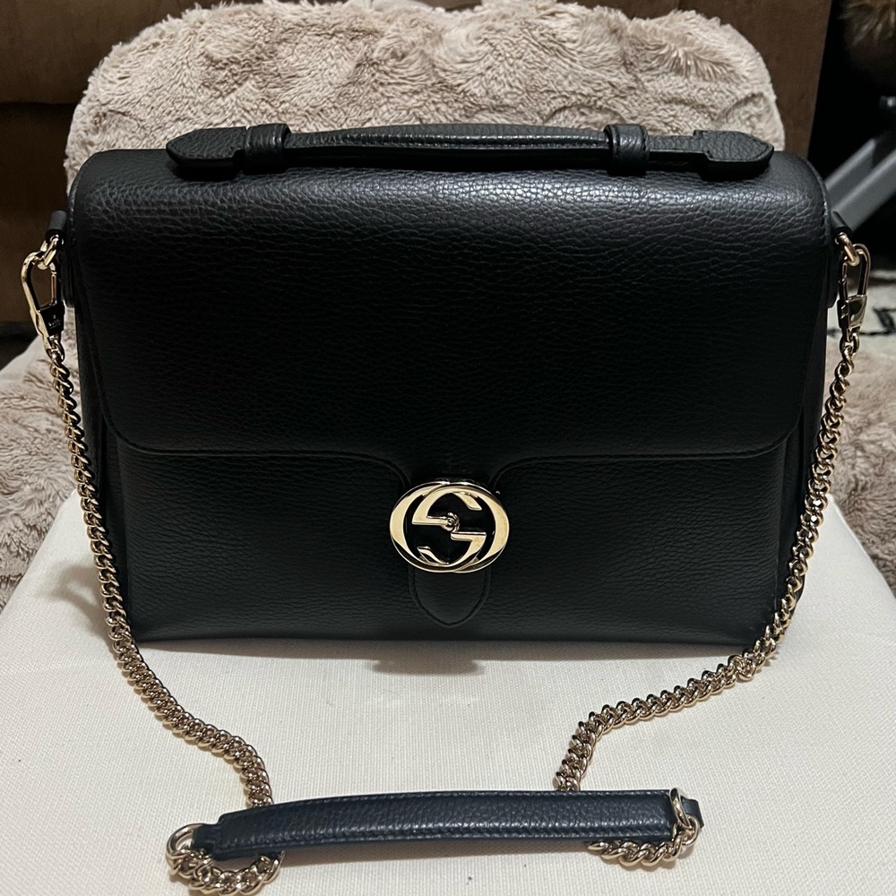 Gucci shoulder dollar calfskin interlocking black genuine leather crossbody bag.